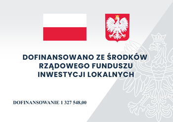 Flaga i Godło Polski z tekstem Dofinansowano ze środków rządowego funduszu inwestycji loklanych